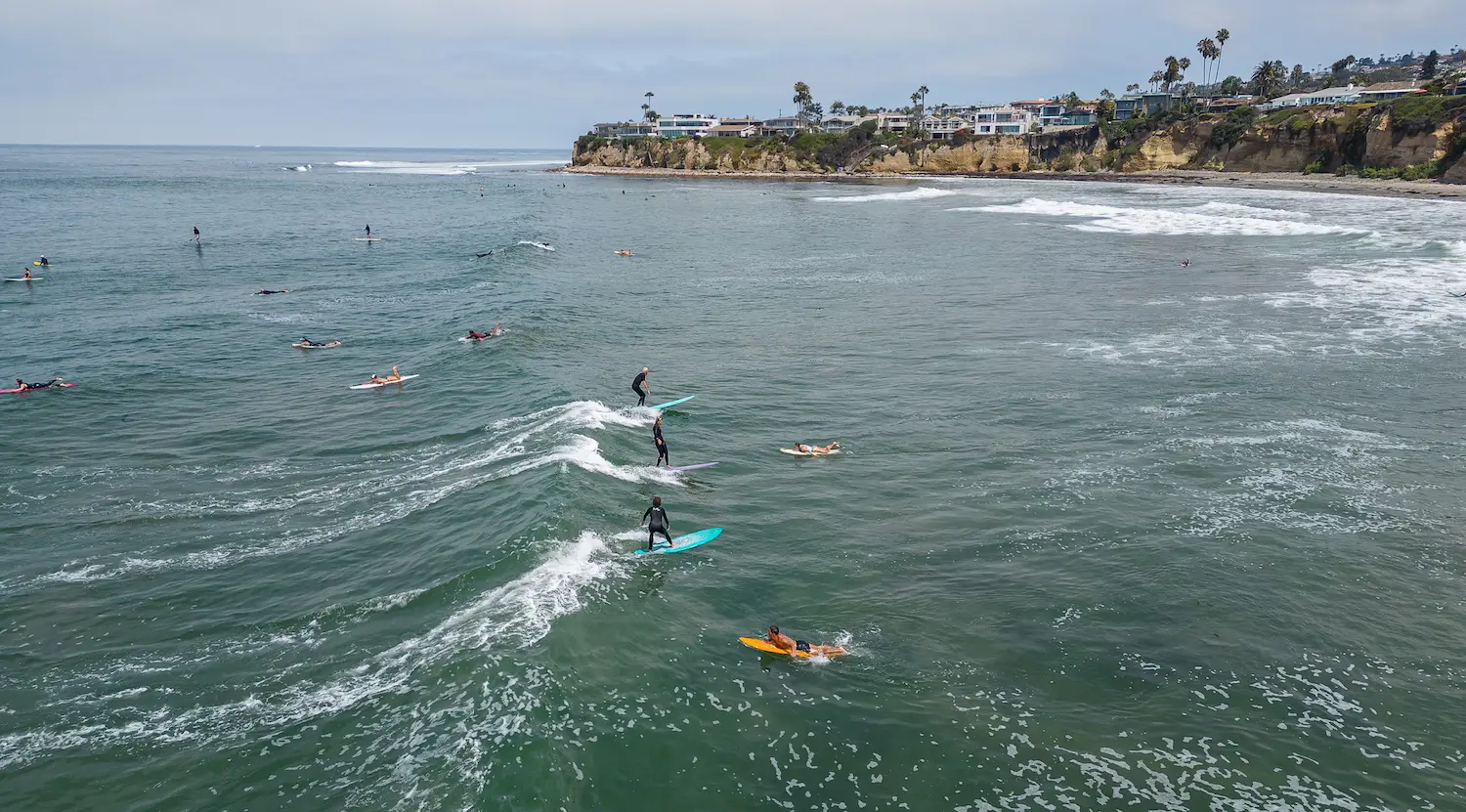 Fun things to do in San Diego on Father's Day 2025 featuring a surf session at Tourmaline Beach
