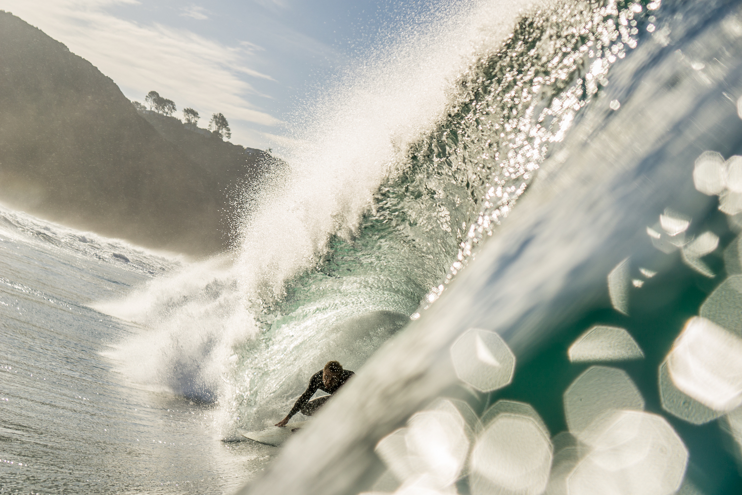 The best surf spots in San Diego featuring Black's Beach, La Jolla with a surfer in a barrel 