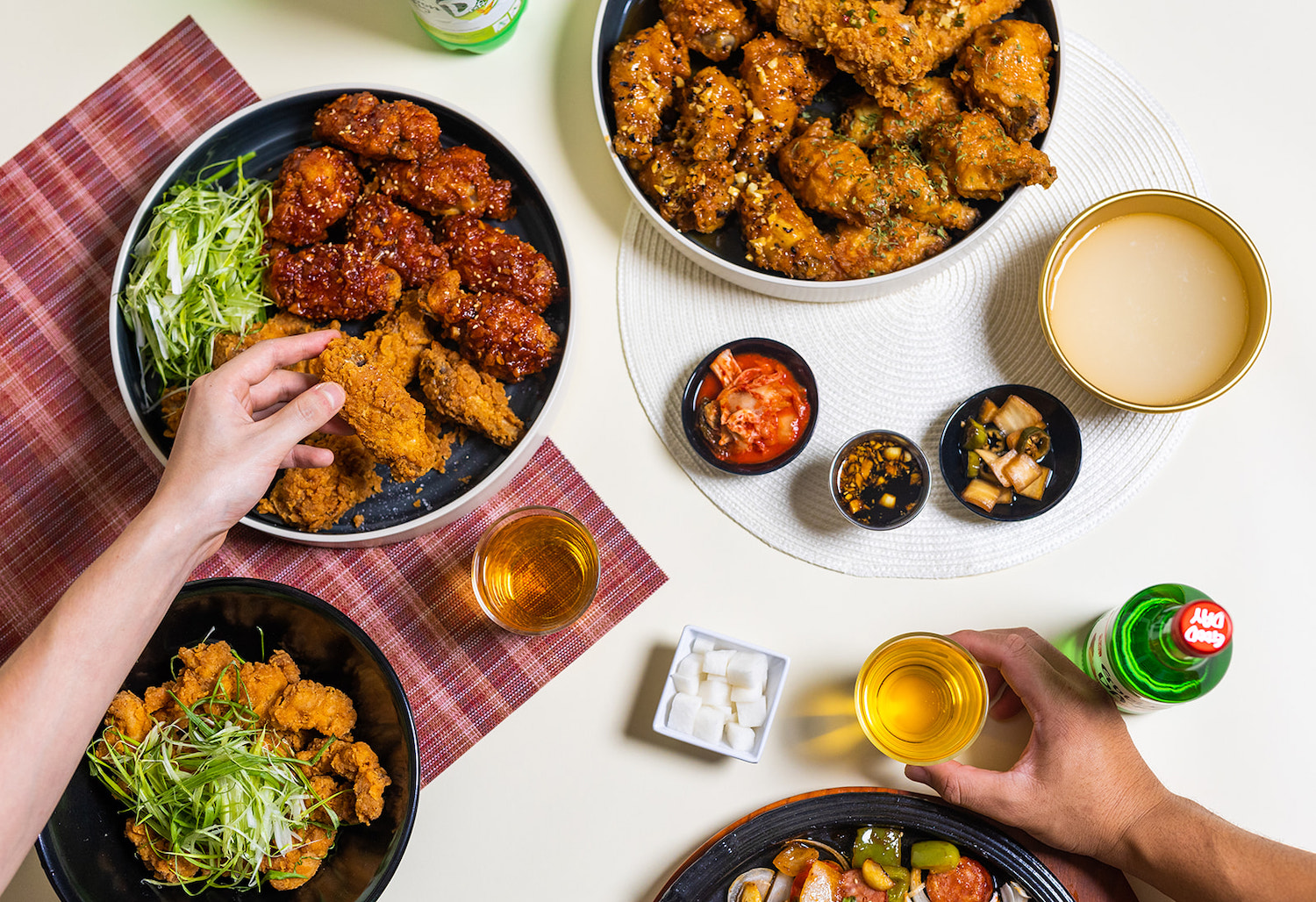 Food from Korean restaurant Honeyjam Korean Chicken & Beer that opened in University City, San Diego