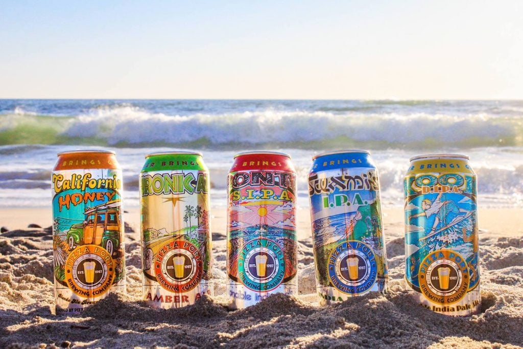 Best San Diego breweries and beer featuring Pizza Port cans at the beach
