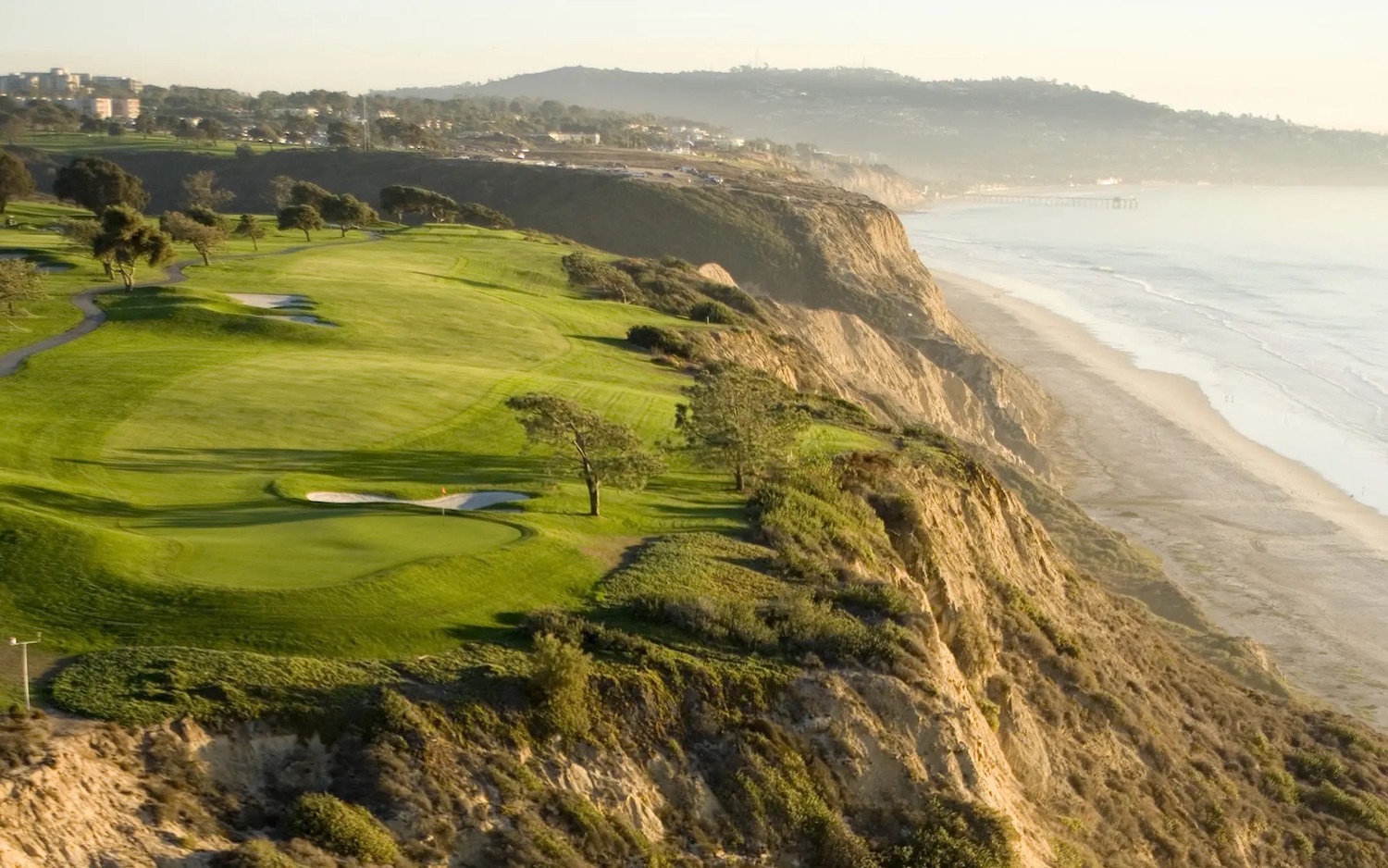 Fun things to do on Father's Day in 2024 including Torrey Pines golf course at sunset along the cliffs
