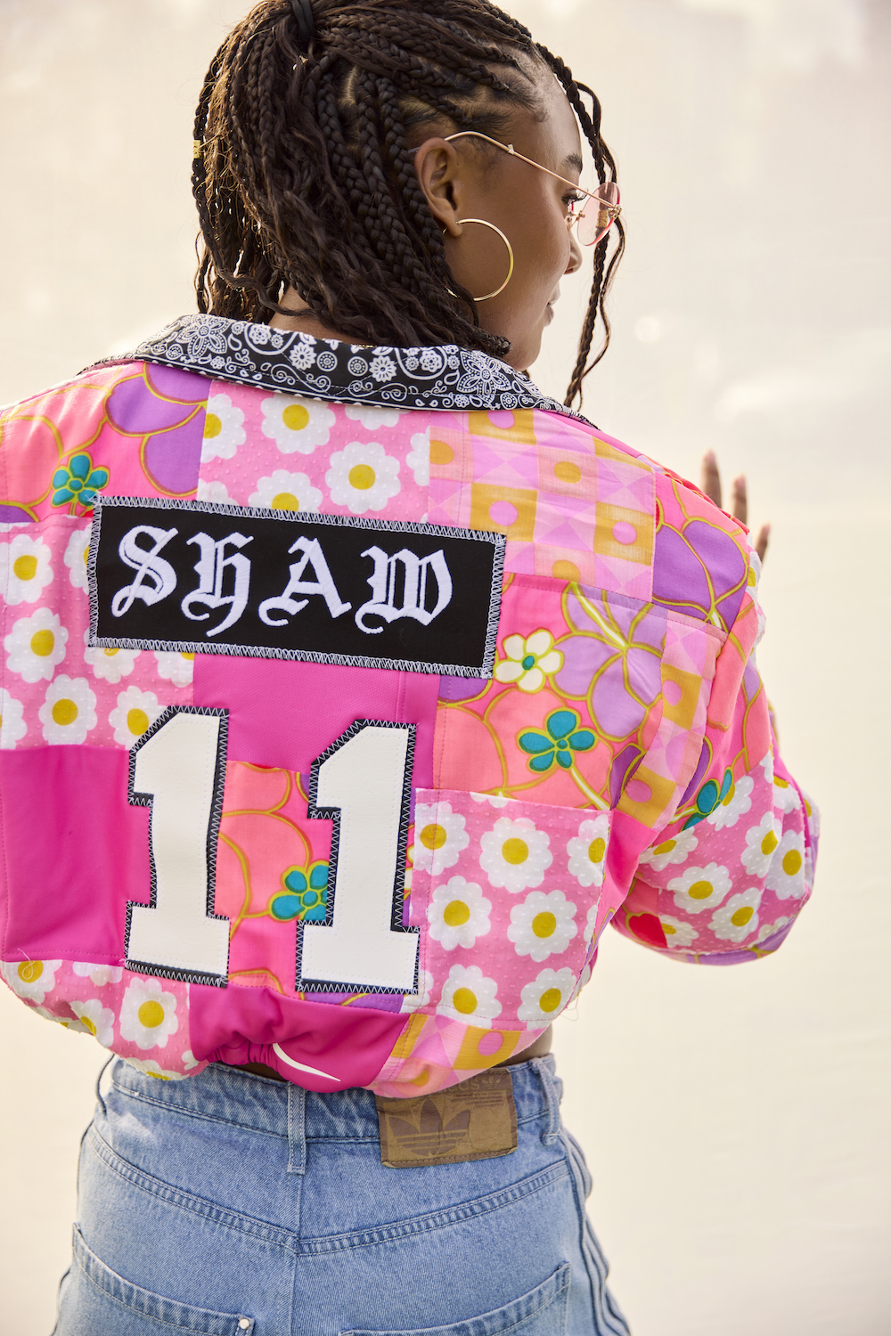 San Diego athlete Jaedyn Shaw, who plays forward for the San Diego Wave Futbol club and has been selected for the 2024 Paris Olympics, wearing a custom Sew Loka jacket with her number 11