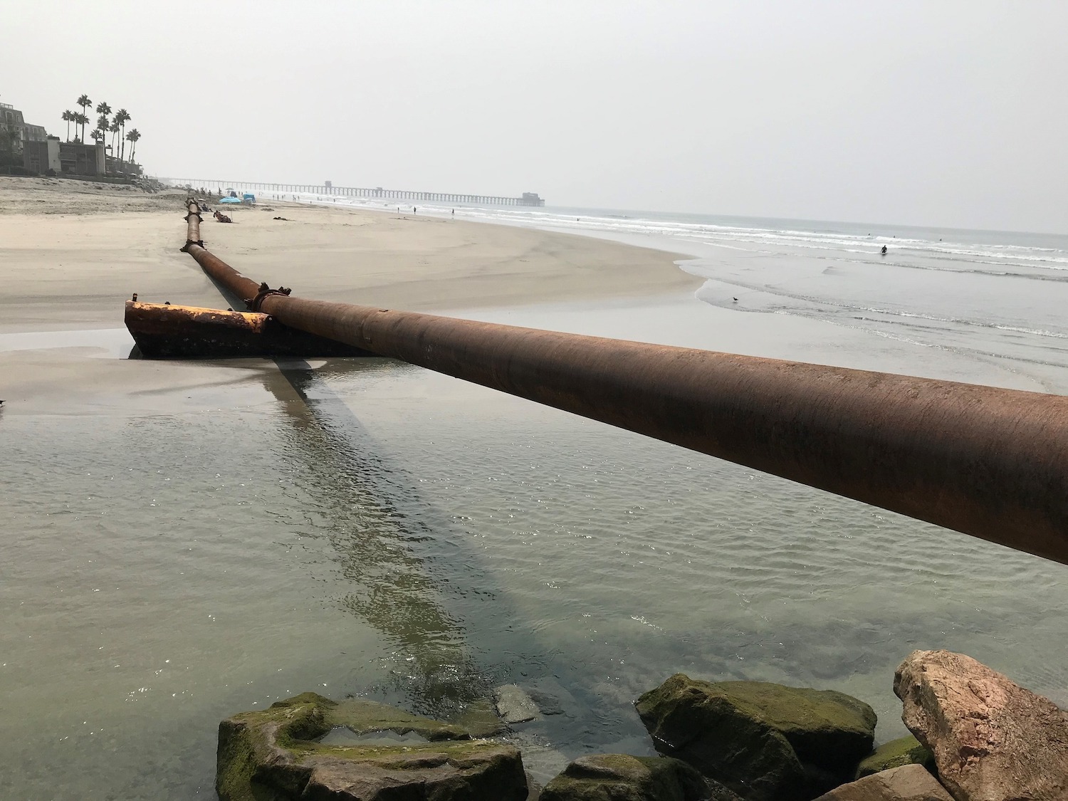 Large pipes at a San Diego beach in Oceanside where sand is transported and resupplied following erosion