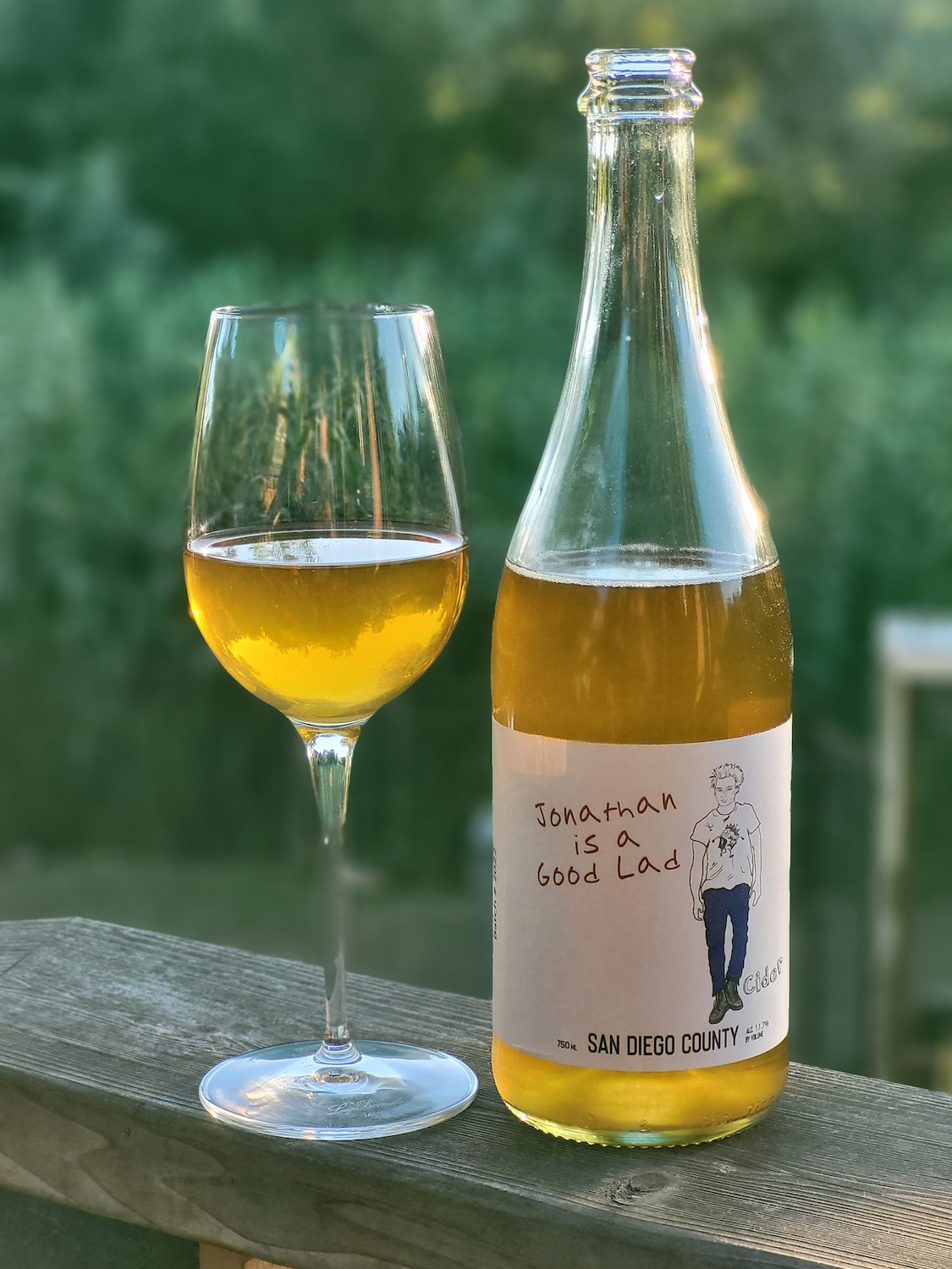 San Diego local brewery Raging Cider & Mead Co. from San Macros featuring a bottle of cider