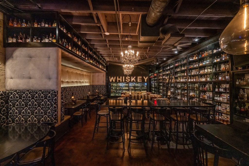 Interior of The Whiskey House in San Diego's Gaslamp Quarter featuring one of the world's largest collections of Whiskeys offering a Father's Day special