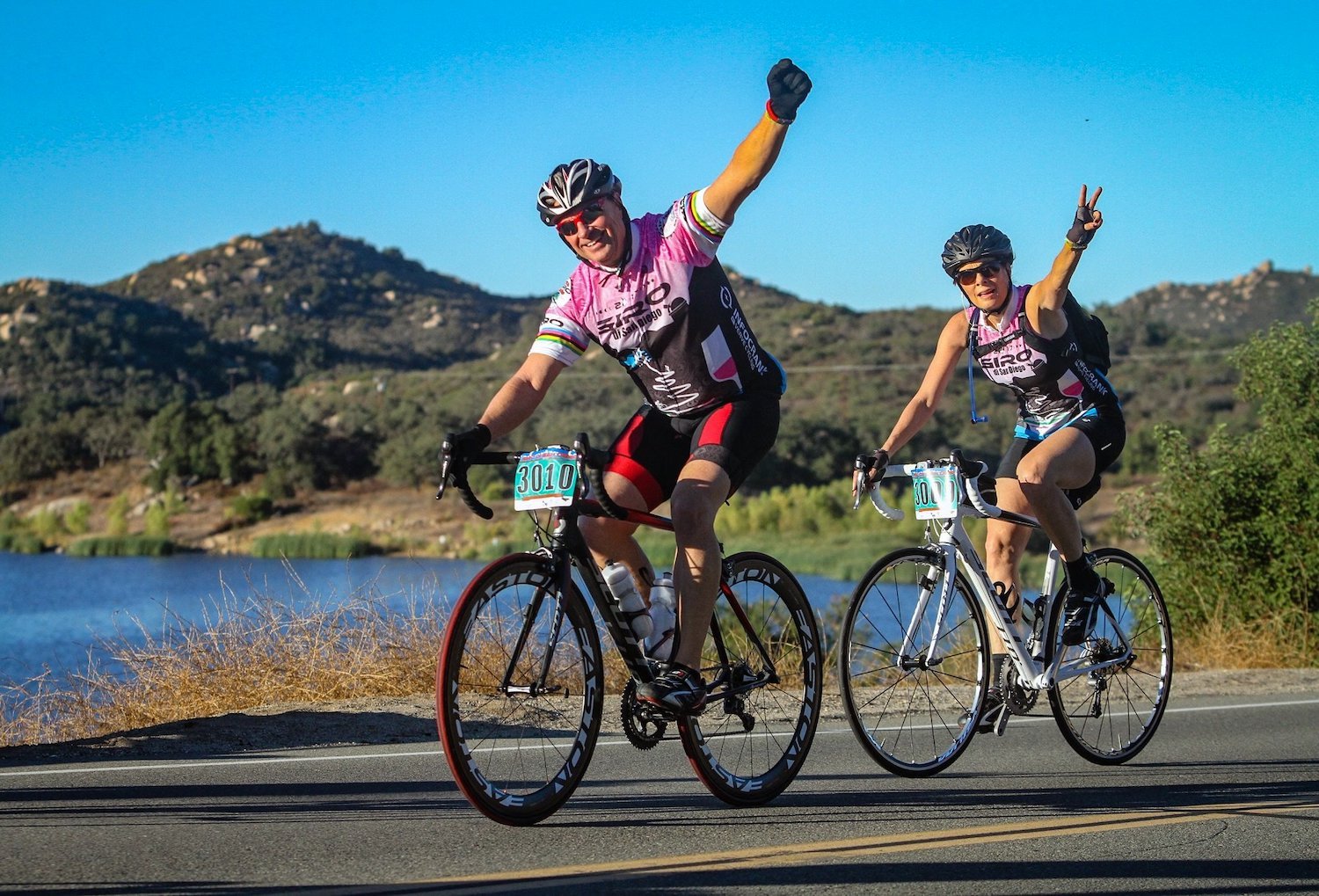 Things to do this weekend in San Diego including the Giro Di San Diego GranFondo Bike Race featuring two cyclists waving