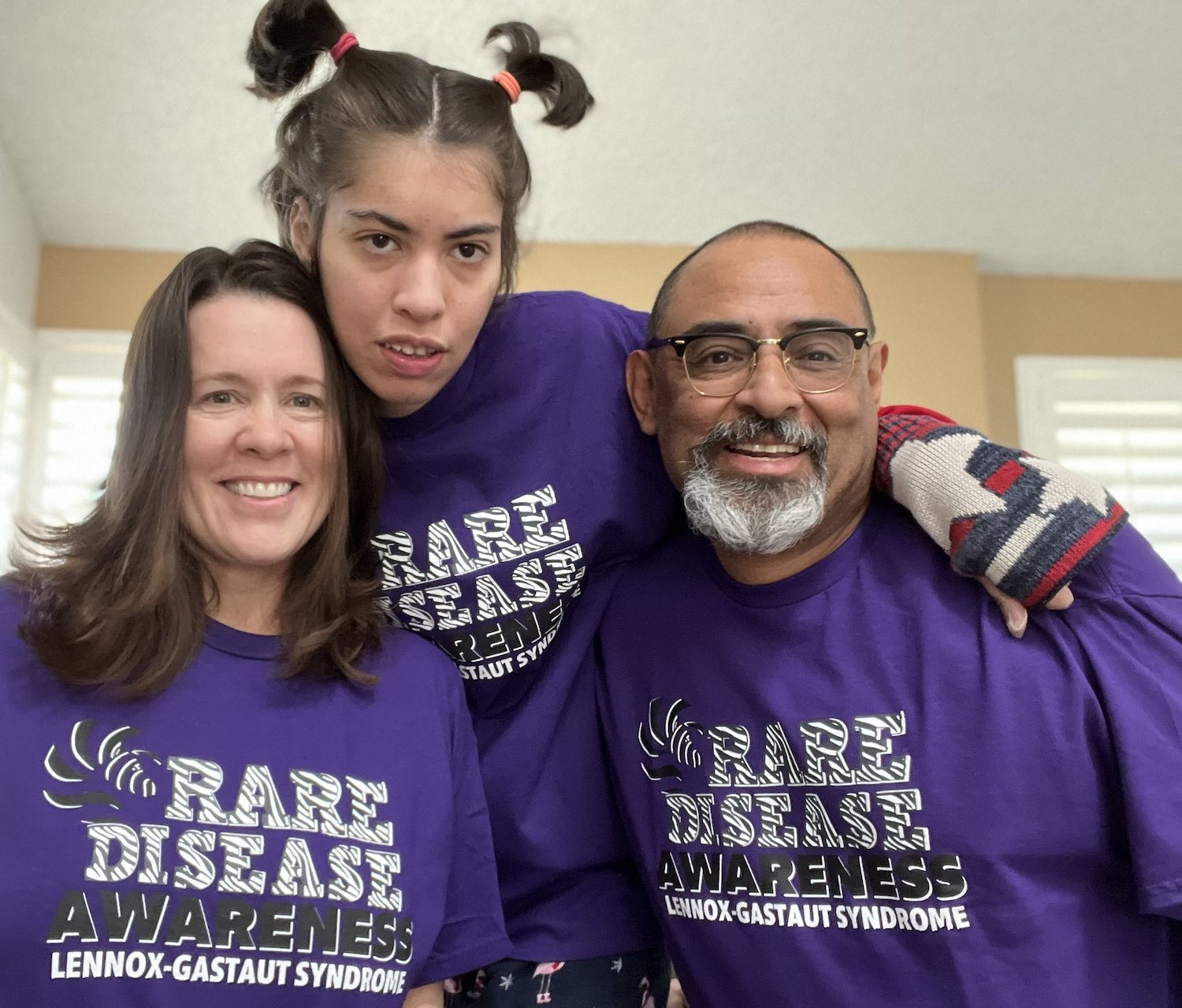 Tracy Dixon-Salazar with her husband and daughter with rare epilepsy Lennox-Gastaut syndrome