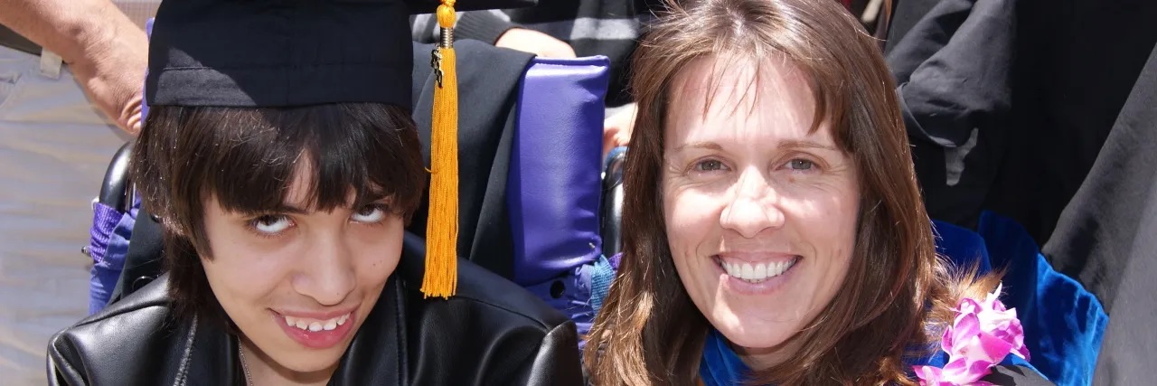 Tracy Dixon-Salazar a San Diego mother at her P.H.D ceremony with her daughter with rare epilepsy Lennox-Gastaut syndrome