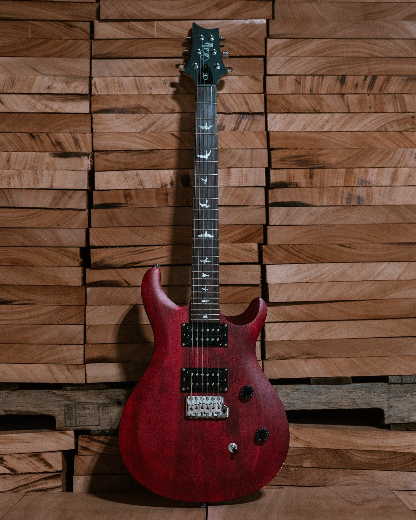 Red electric guitar from San Diego guitar shop Pitbull Audio in National City 