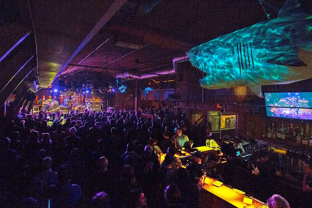 Historical photo of the interior of the San Diego music venue The Belly Up Tavern in Solana Beach celebrating its 50th anniversary