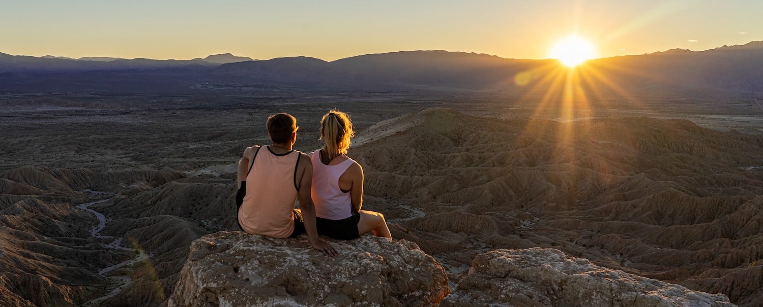 New California State Library Parks Pass allowing access to the state's parks and reserves featuring Anza Borrego hikers overlooking a valley