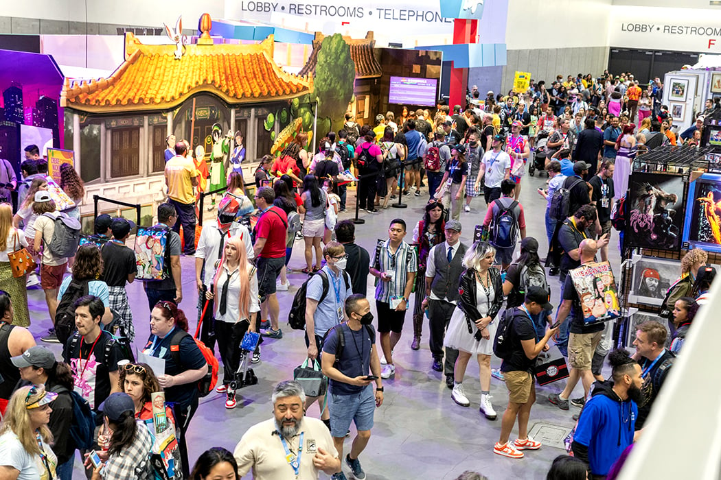 San Diego Comic-Con 2024 featuring the interior of the exhibit hall featuring vendors, artists, and comic merchandise 