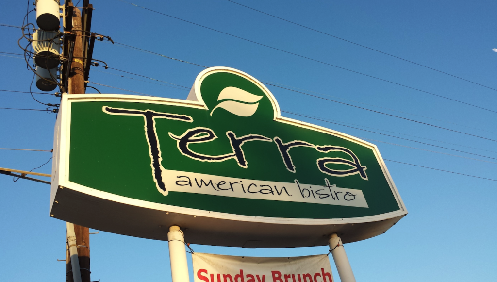 Exterior sign of San Diego restaurant Terra American Bistro in La Mesa which is switching to a catering service