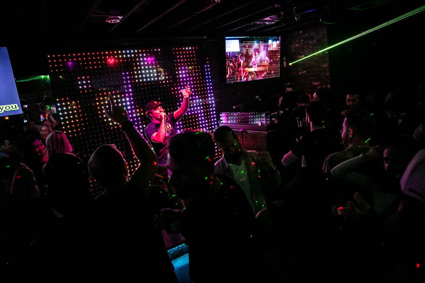 Interior of San Diego Karaoke Bar The Lamplighter in Hillcrest featuring a stage and themed karaoke nights