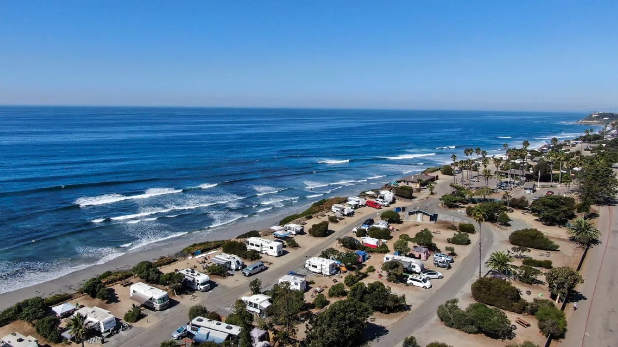New California State Library Parks Pass allowing access to the state's parks and reserves featuring San Elijo State Beach in San Diego
