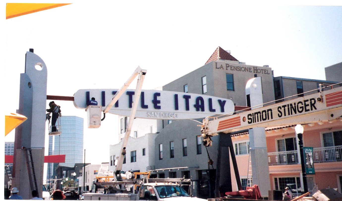 Historical photo of the New City America team building Little Italy, San Diego's new sign