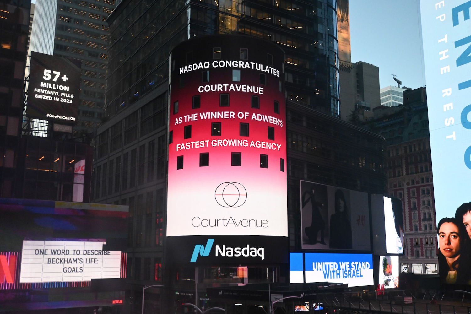 Times Square New York featuring a sign congratulating San Diego agency CourtAvenue on being awarded the fastest growing agency by AdWeek in 2023