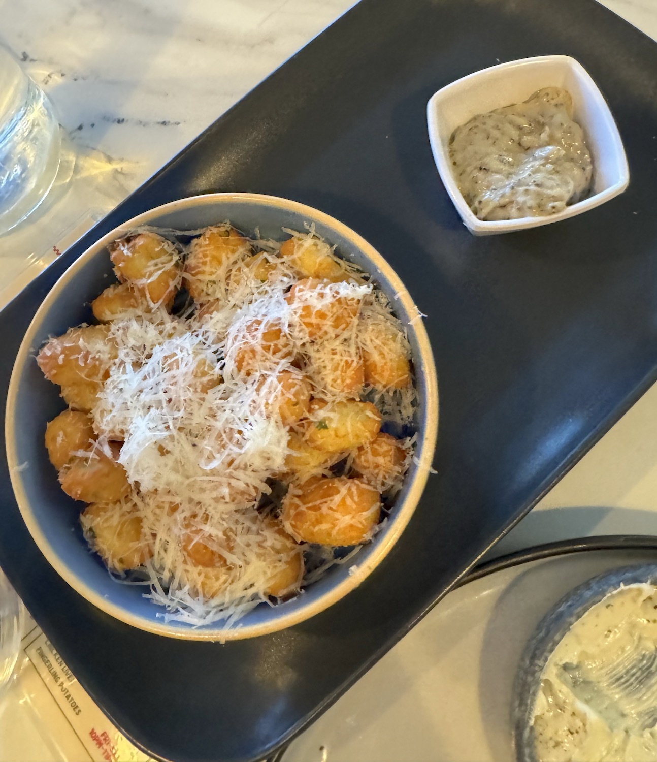 The best food and drinks in San Diego to try this month featuring Crispy Cacio E Pepe Gnocchi from. Sam the Cooking Guy's Little Italy restaurant Basta