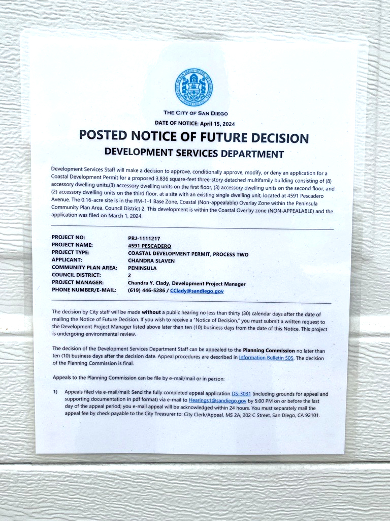 A notice of a new housing development in Ocean Beach, San Diego