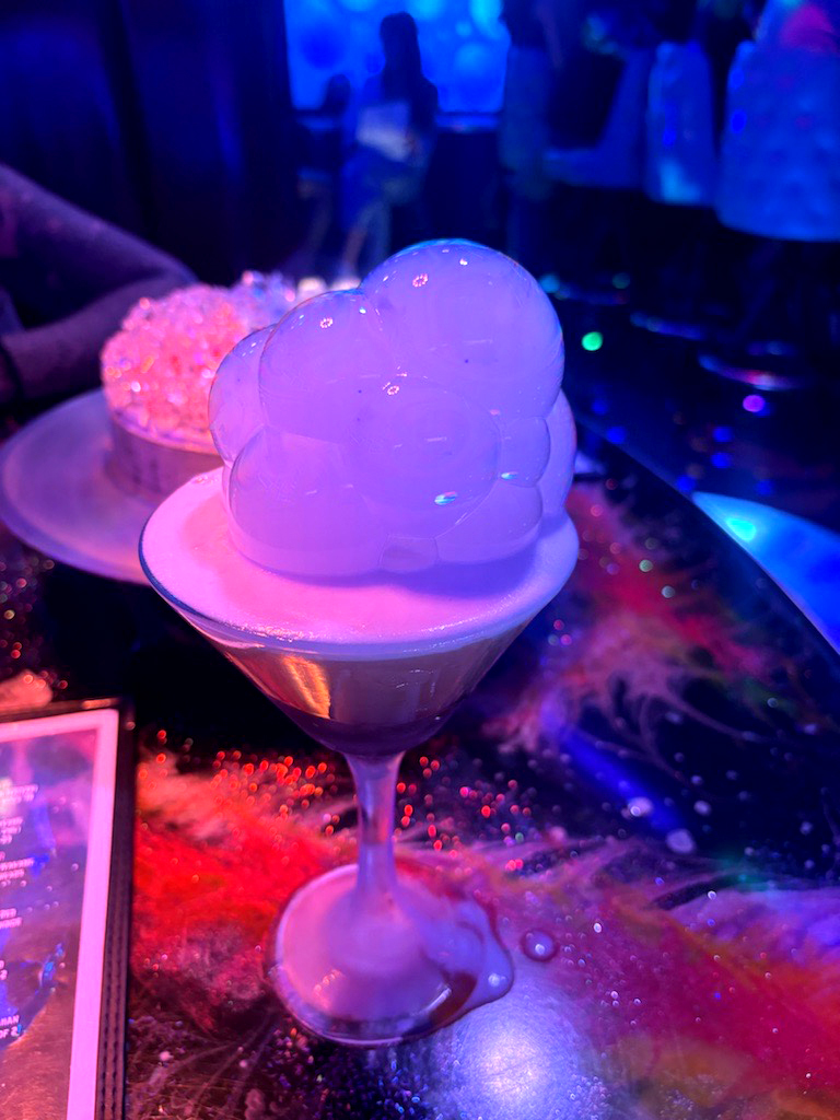 The best food and drinks in San Diego to try this month featuring Spaceman's Sour from The Space Pad in Kilowatt Brewing's space-themed speakeasy