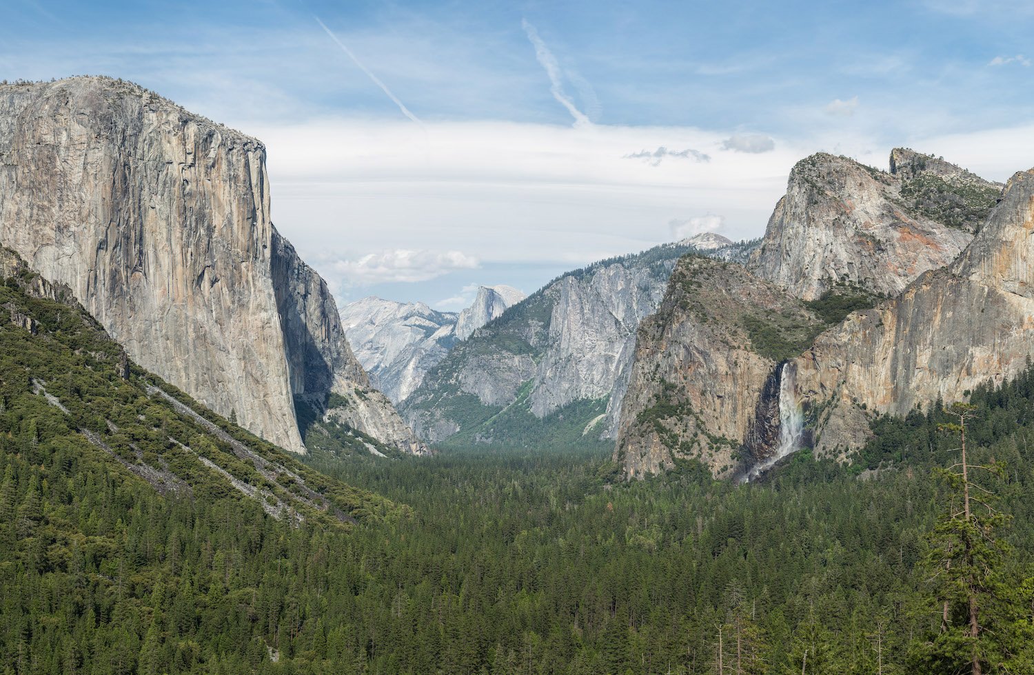 Things to do in California featuring the Yosemite Valley tunnel view with mountains and forest in the background