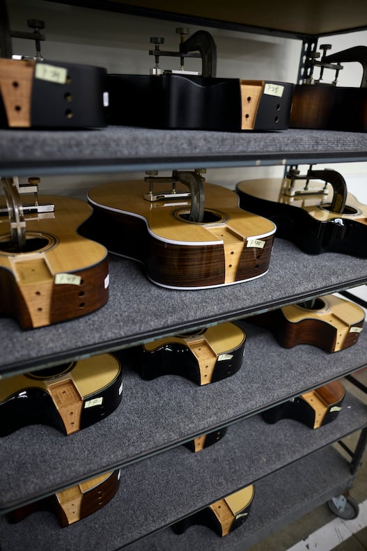 Taylor Guitars acoustic bodies ready for assembly at the brand's factory in  El Cajon, San Diego