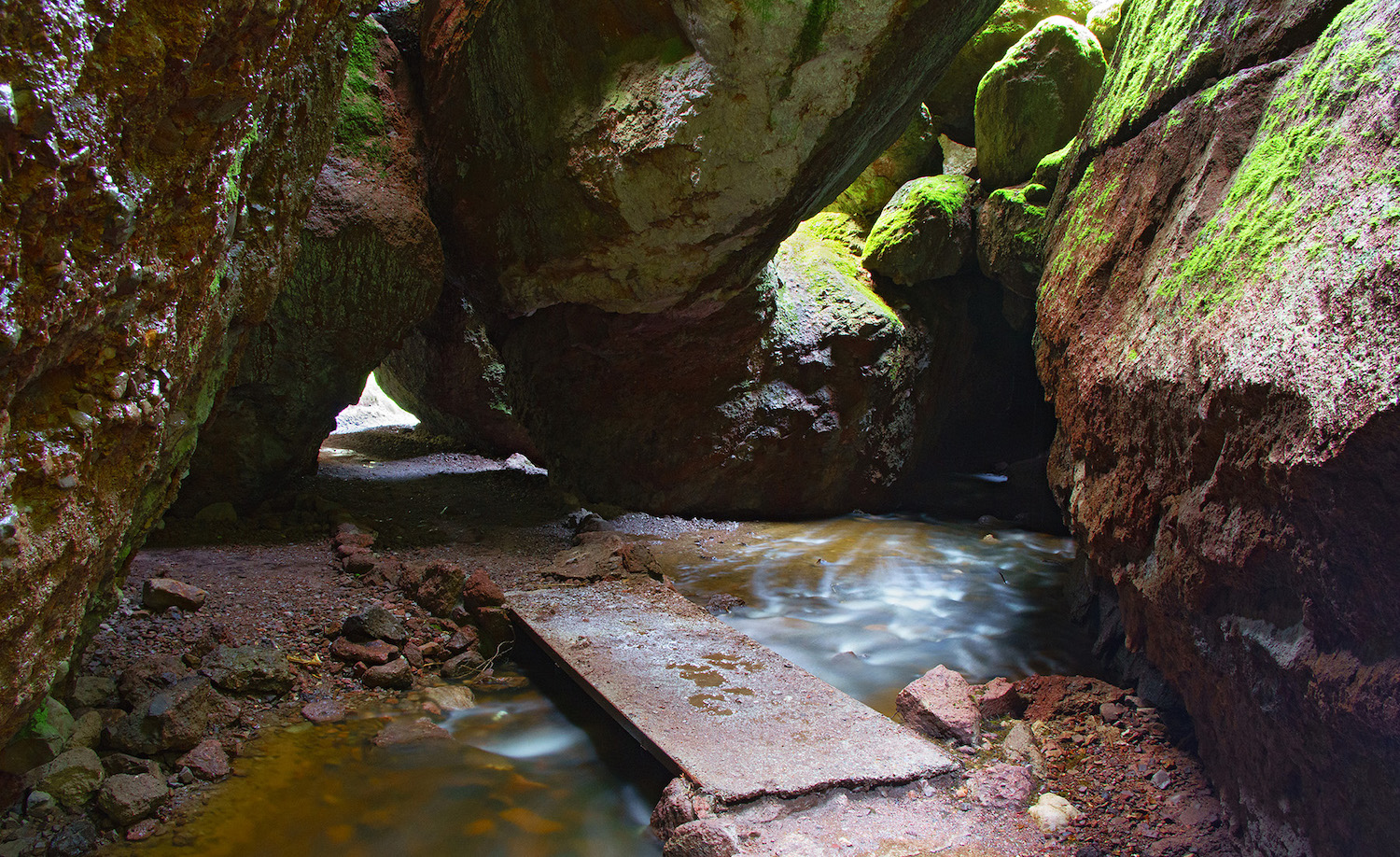 Guide to visiting California's national parks featuring Pinnacles National Park and Bear Gulch Cave