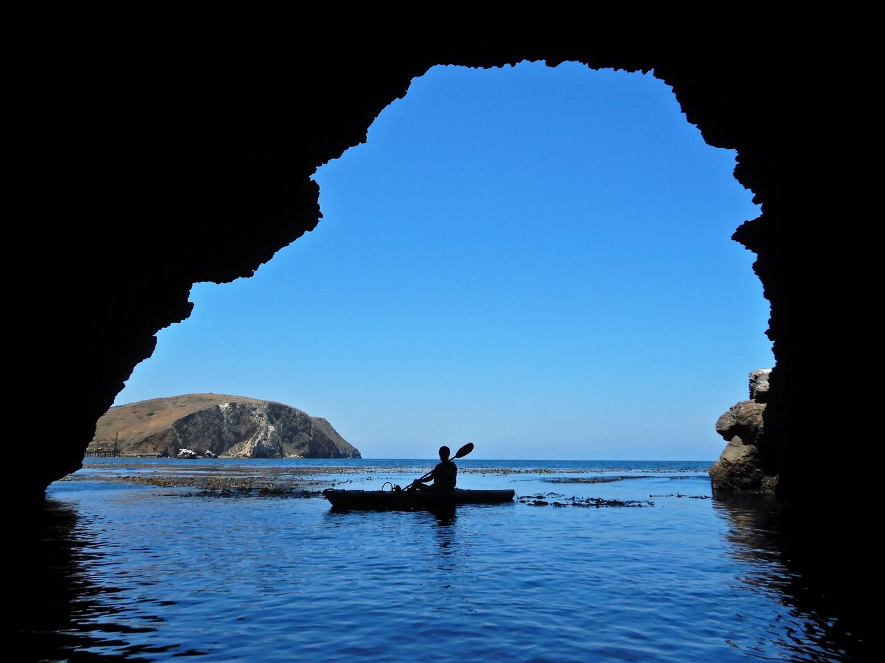 A kayaker in a cave in California's Channel Islands National Park