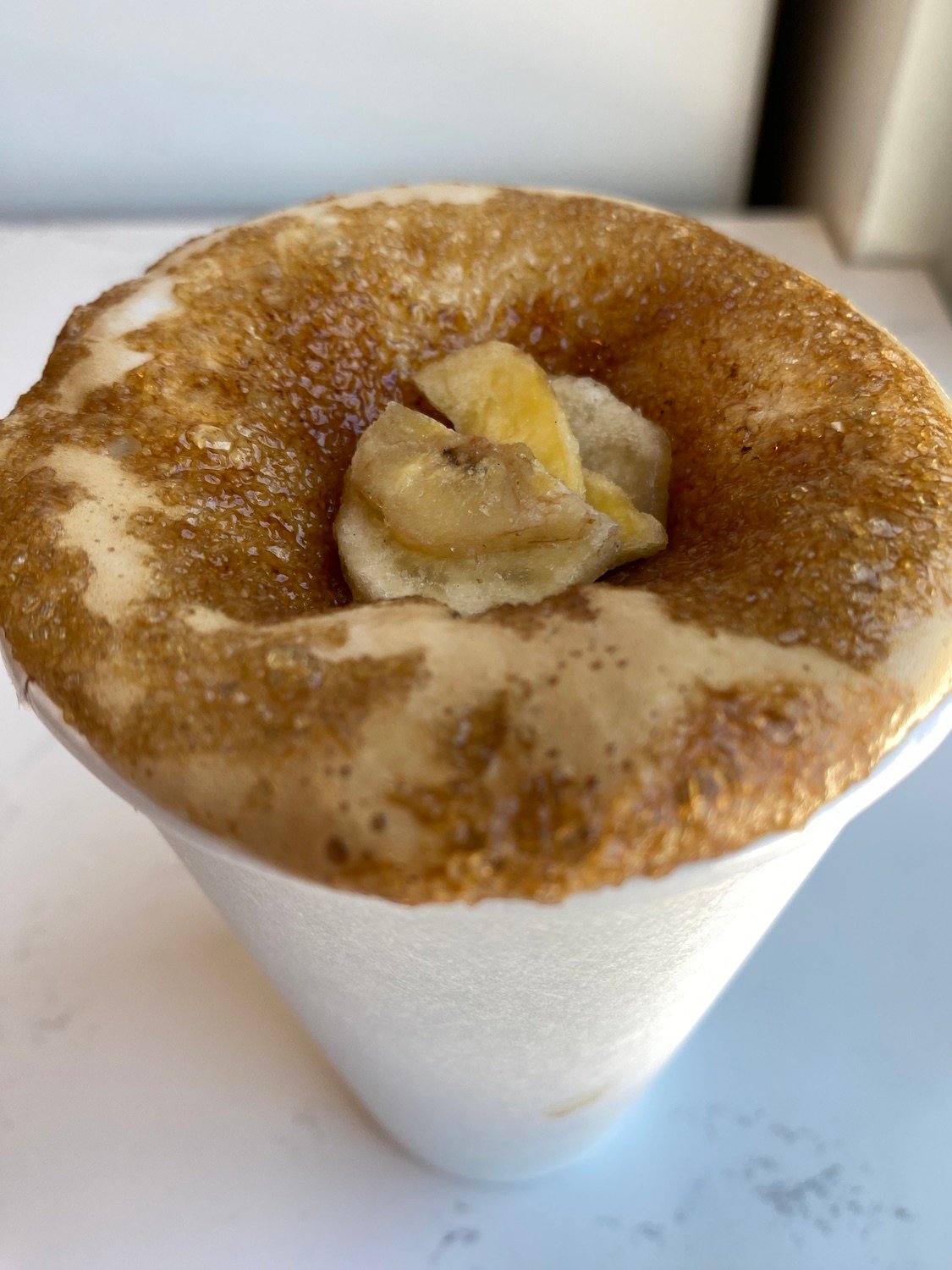 Best food to eat from San Diego restaurants featuring Turon Crème Brülée Latte from Mostra Coffee in Bankers Hill