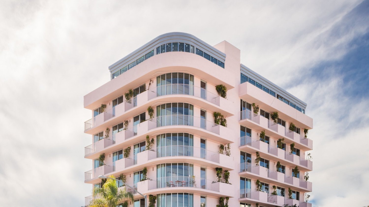 Exterior of the new Sasan building in Mission Hills, San Diego featuring a new rooftop restaurant Communion and a cafe called Paradis opening soon