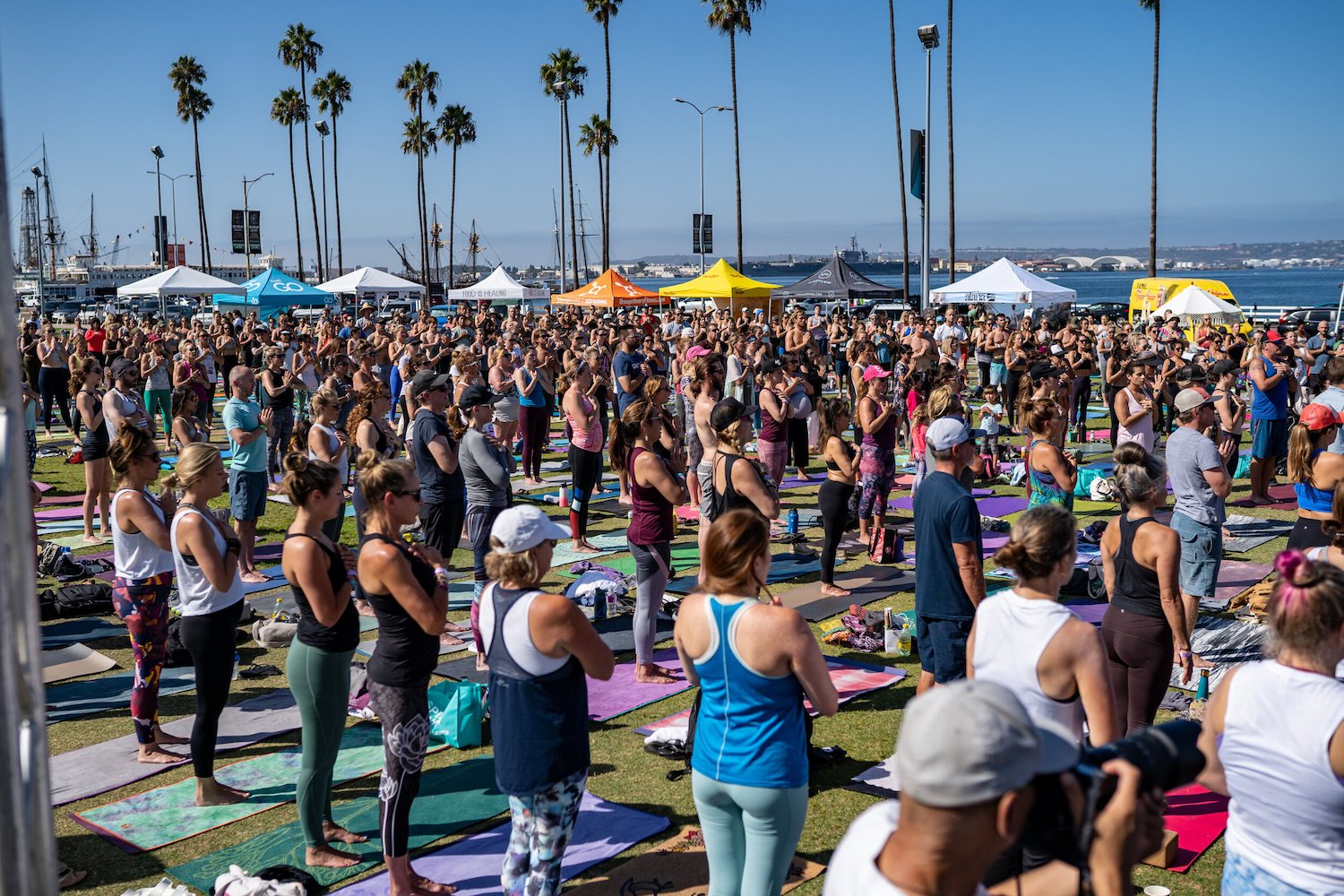 San Diego nonprofit One Love Moment is behind the country's largest yoga events which serve as fundraisers for charitable causes