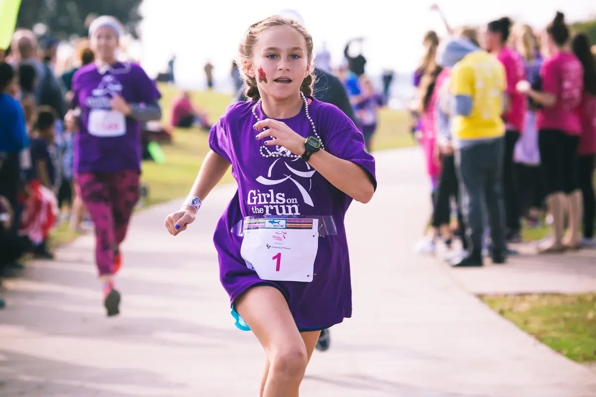 San Diego nonprofit Girls on the Run San Diego featuring a  girl participating in a running event