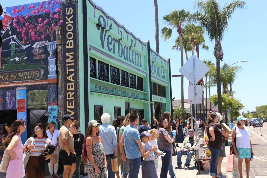 Things to do in San Diego this weekend October 24-27, 2024 featuring  the North Park book crawl with local bookstore Verbatim Books in the background 