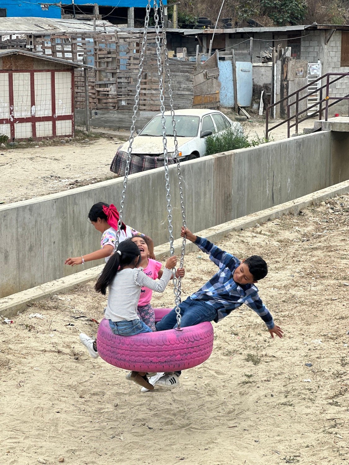 Kids on a playground in os Laureles Park in Tijuana, Mexico