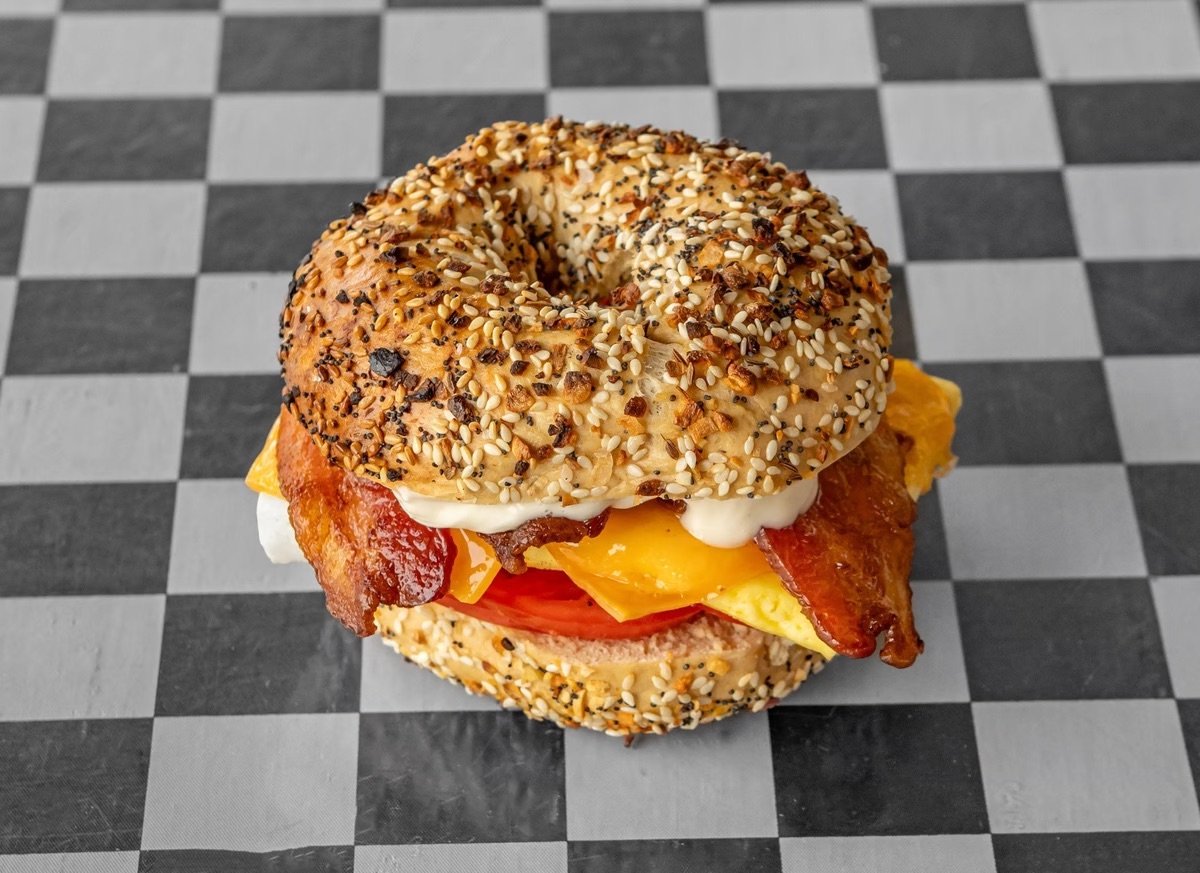 San Diego bakery Inglorious Bagels featuring an angry everything bagel sandwich