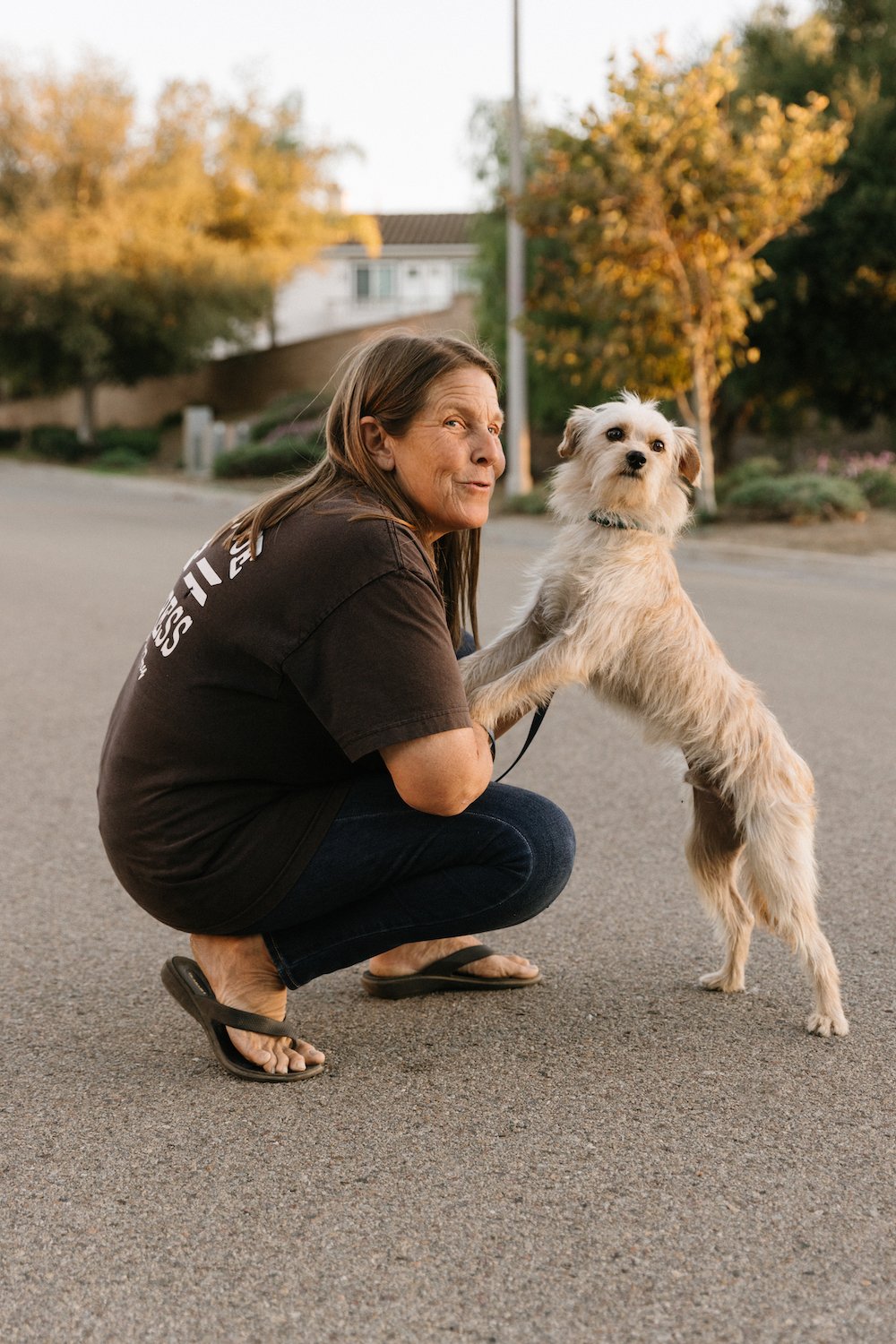 Babs Fry founder of San Diego nonprofit A Way Home For Dogs with one of her rescued pets