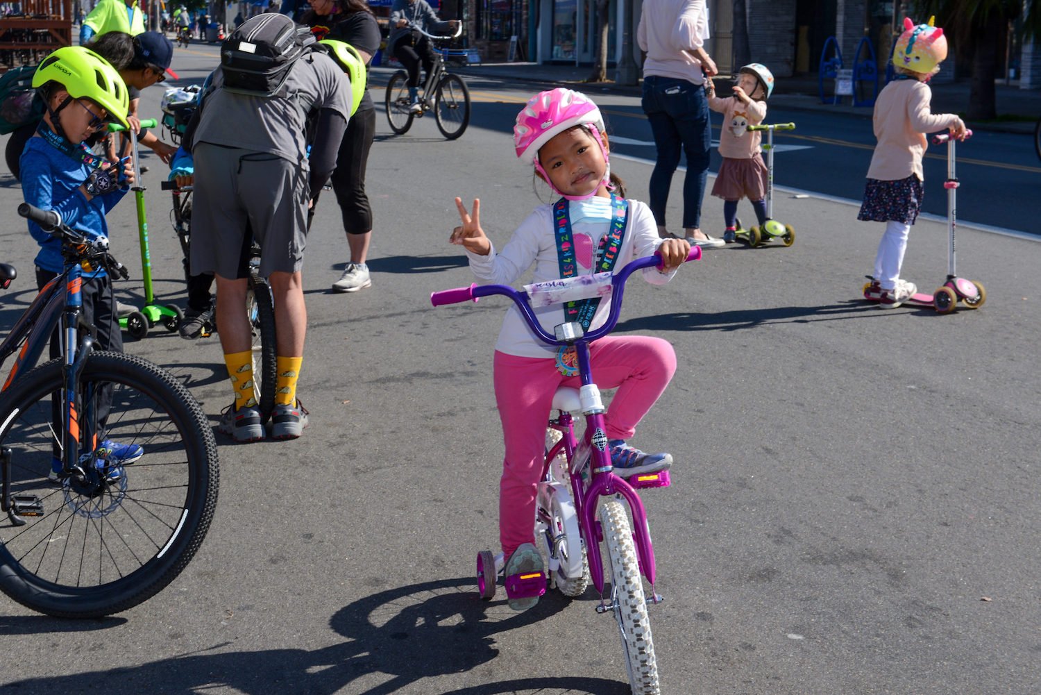 San Diego County Bicycle Coalition featuring a kid riding a donated bike