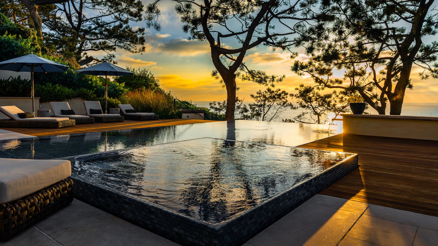 Patio and pool of luxurious Del Mar home owned by Kerry and Corrine Marsh 