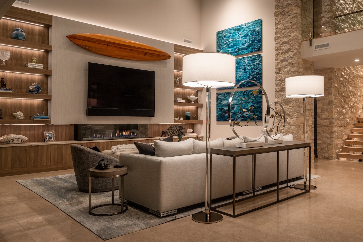 Interior of luxurious San Diego home in Del Mar owned by Kerry and Corrine Marsh featuring a surfboard decoration 