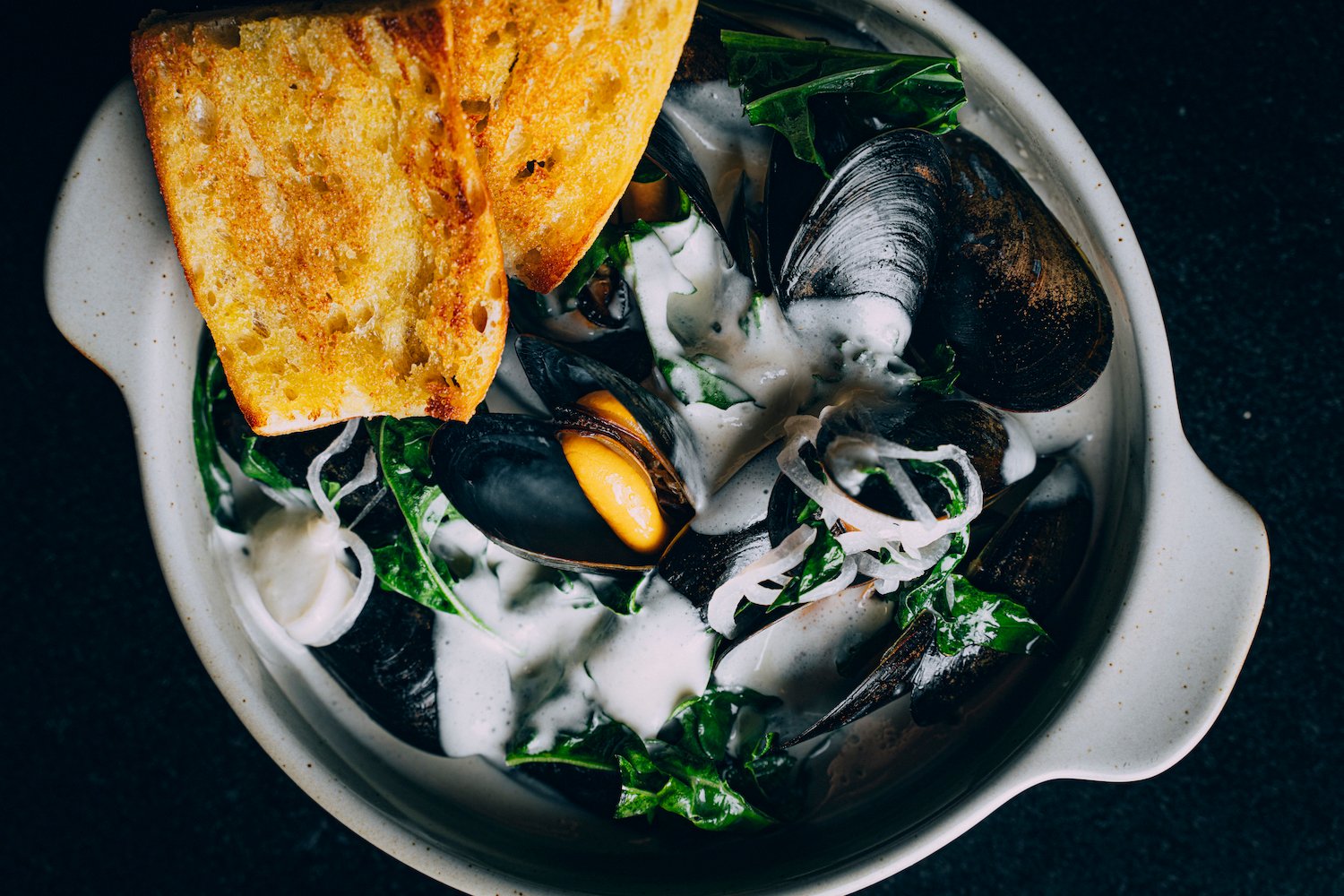 Mussels à la Paris from San Diego French restaurant Le Coq in La Jolla