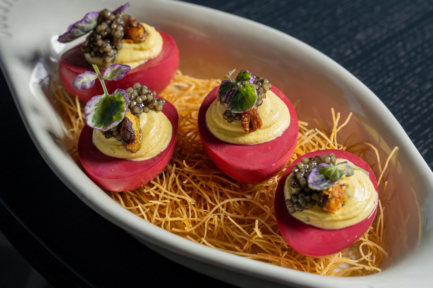 Beet- and hibiscus-cured eggs with praline mousse from San Diego restaurant Ponyboy at The Pearl Hotel in Point Loma