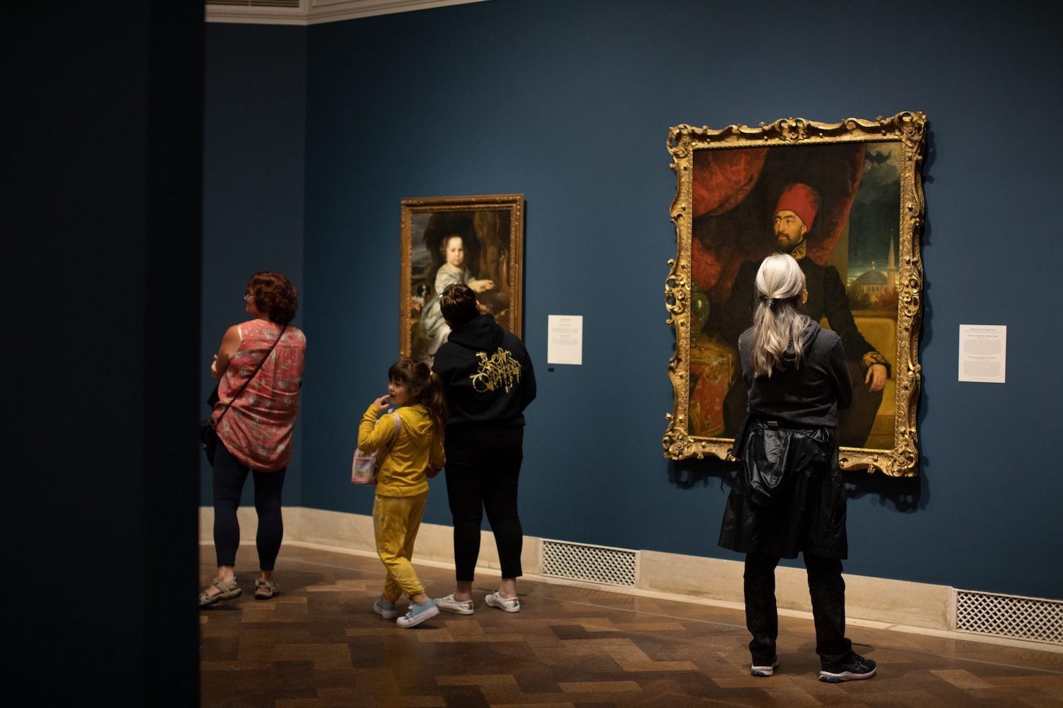 Interior of the San Diego Museum of Art featuring renaissance-era paintings 