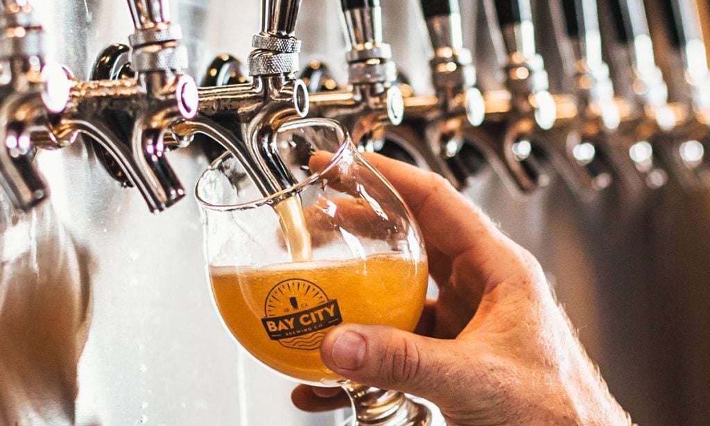 Things to do in San Diego this month, March 2025 featuring Pucks & Pints in collaboration with San Diego Gulls hockey and Bay City Brewing