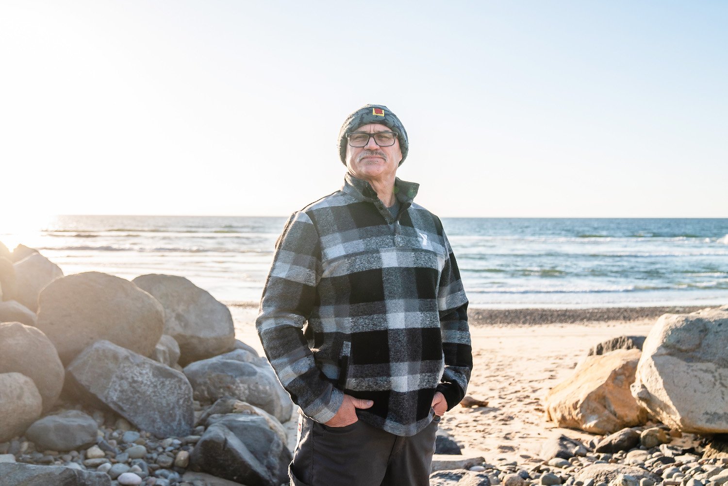 San Diego surfer and Imperial Beach resident Dwayne Fernandez who says pollution has forced him to surf elsewhere