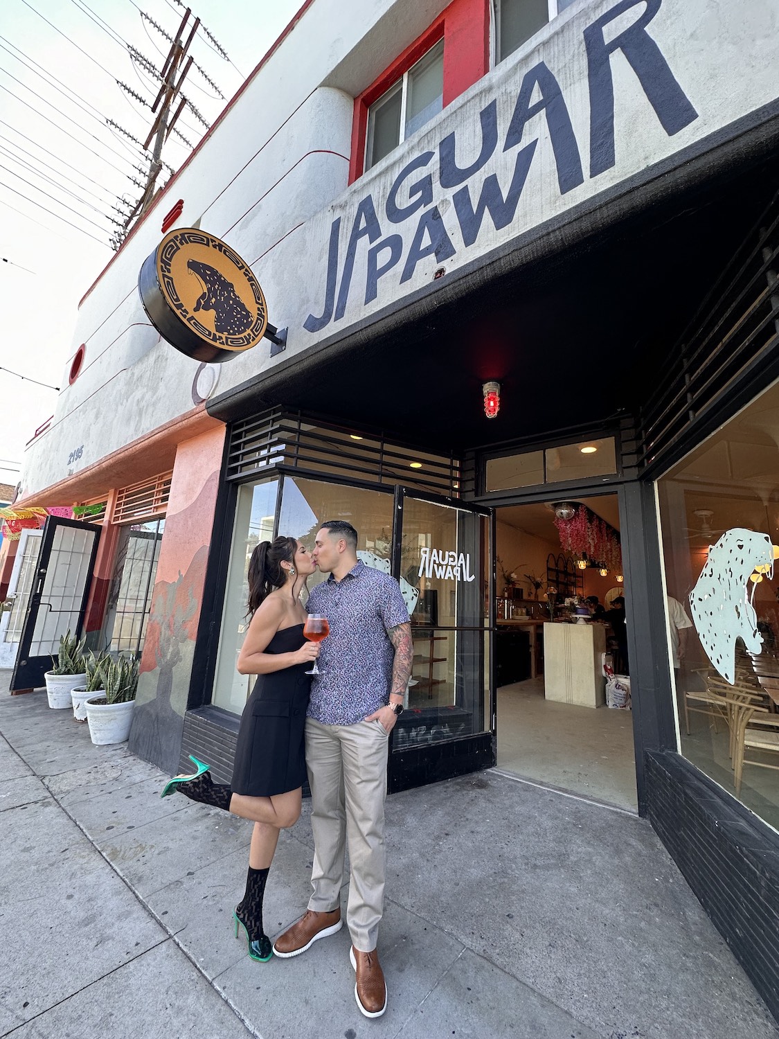 Couple on a date at Jaguar Paw bar and coffee shop in Barrio Logan 