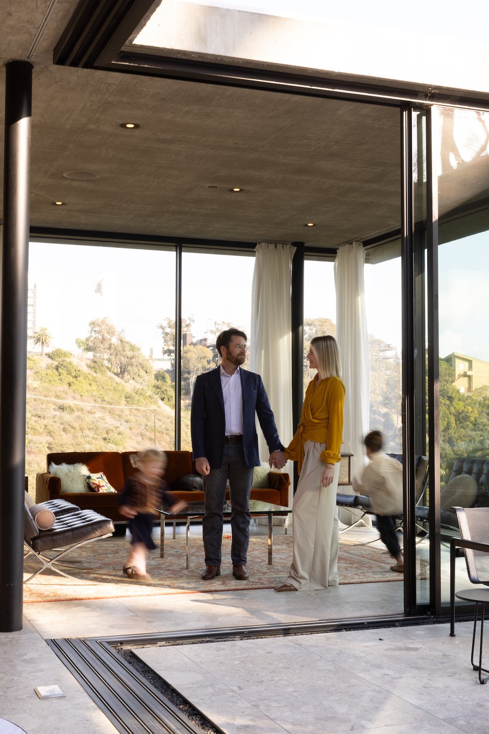 San Diego architect Matthew Segal and his wife April and kids inside their Mission Hills home