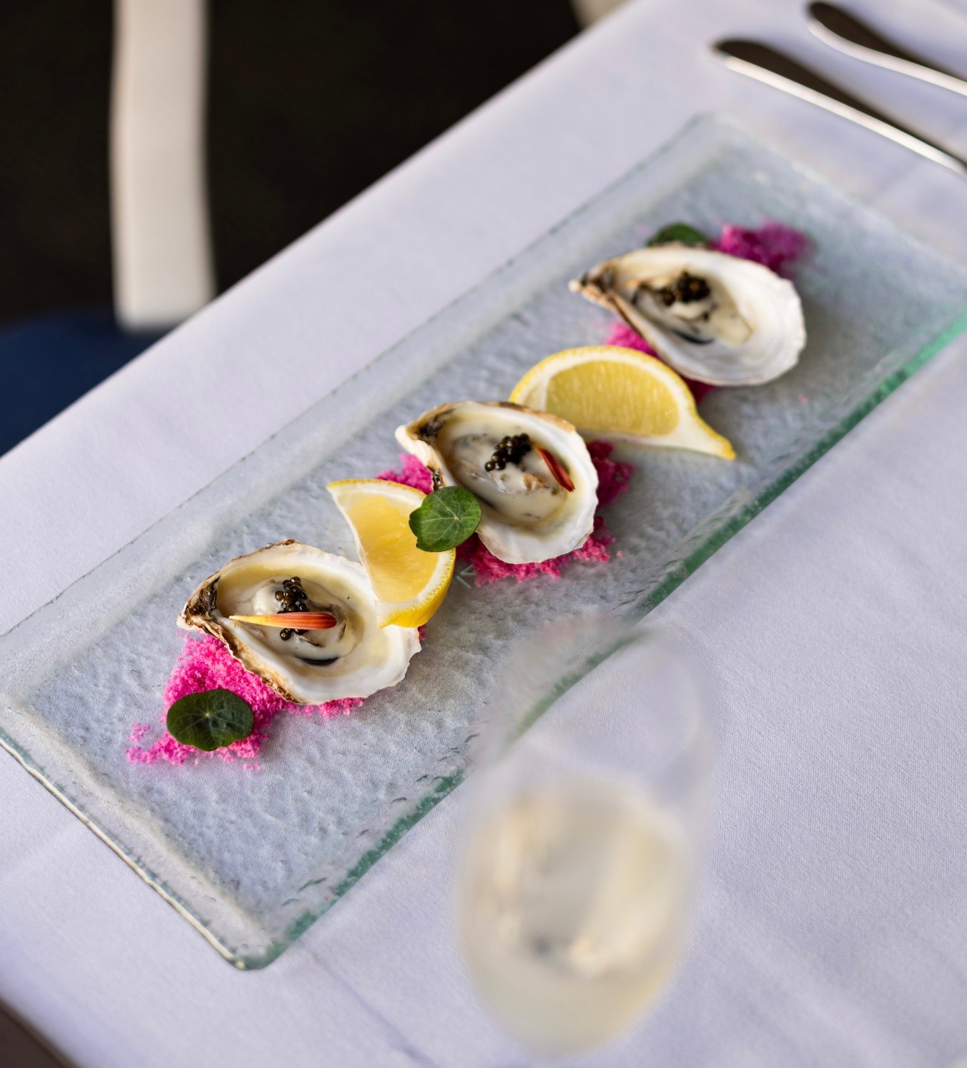 Aphrodisiac food featuring  Pink Moon Oysters from Mille Fleurs in Rancho Santa Fe, San Diego