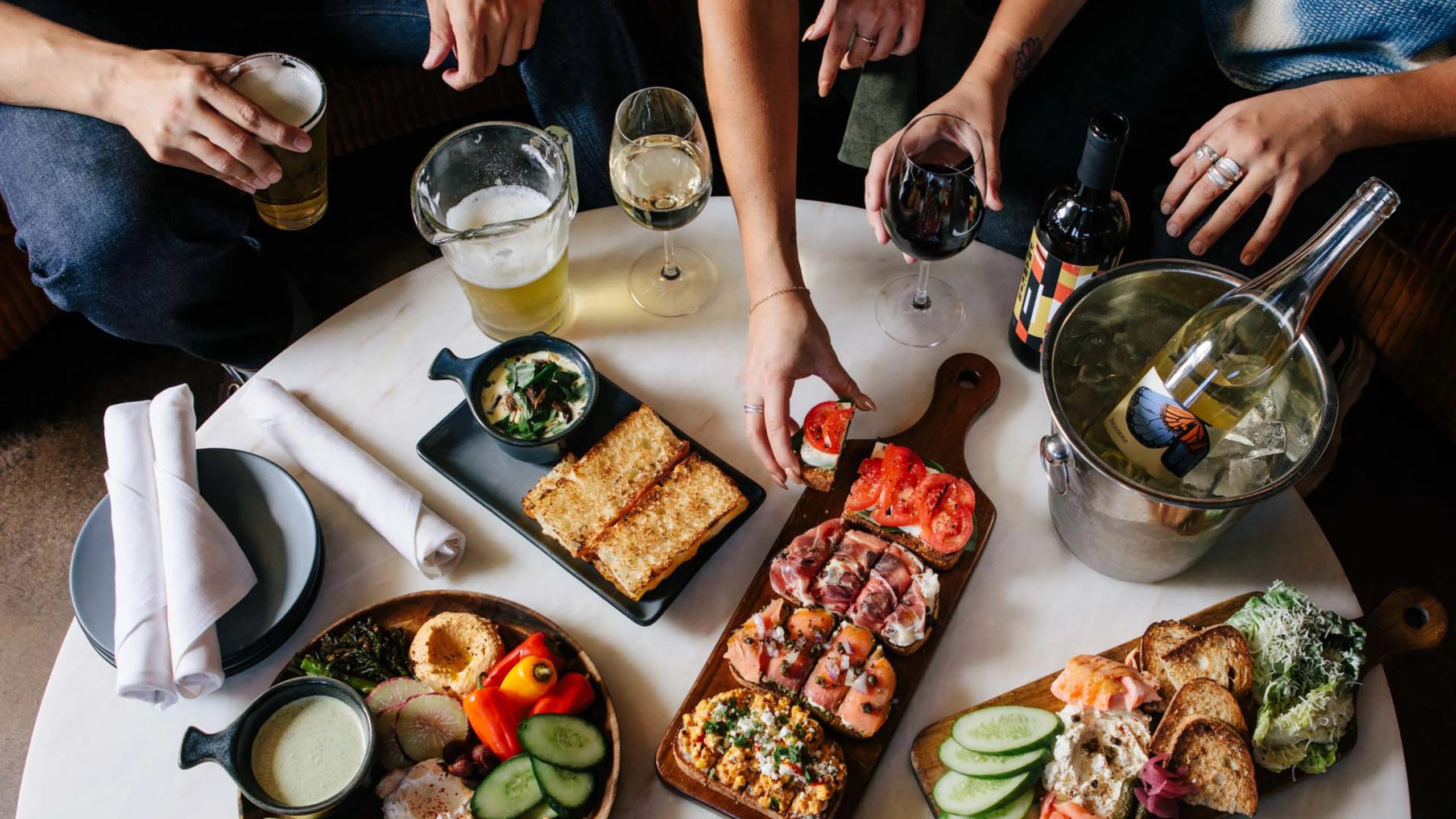 Things to do in San Diego this weekend February 19-23, 20225 featuring food from San Diego restaurant Postino wine bar in Little Italy featuring a Shuck & Sip oyster event