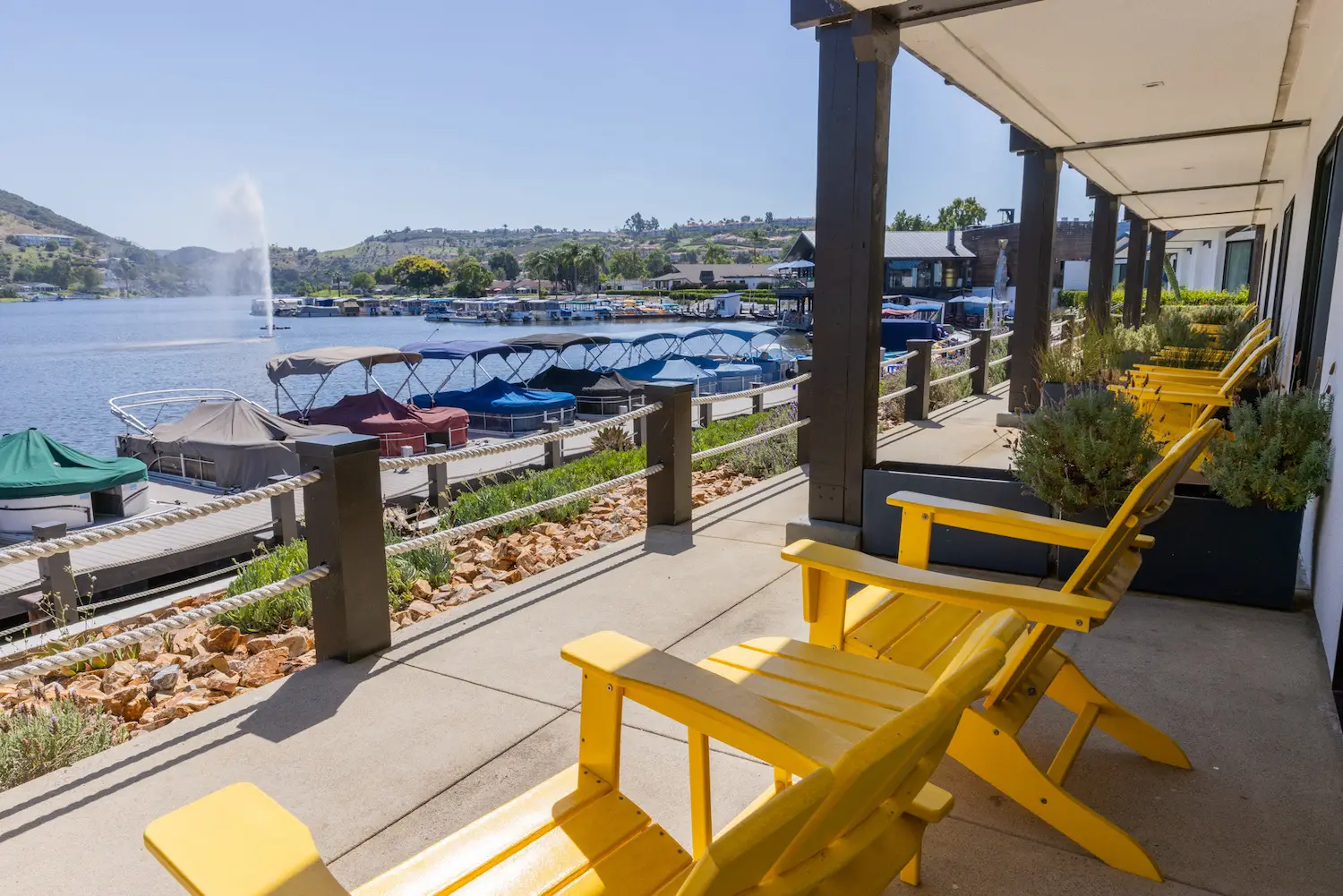 Chairs along lake San Marcos at the Lakehouse Resort in San Diego, CA 