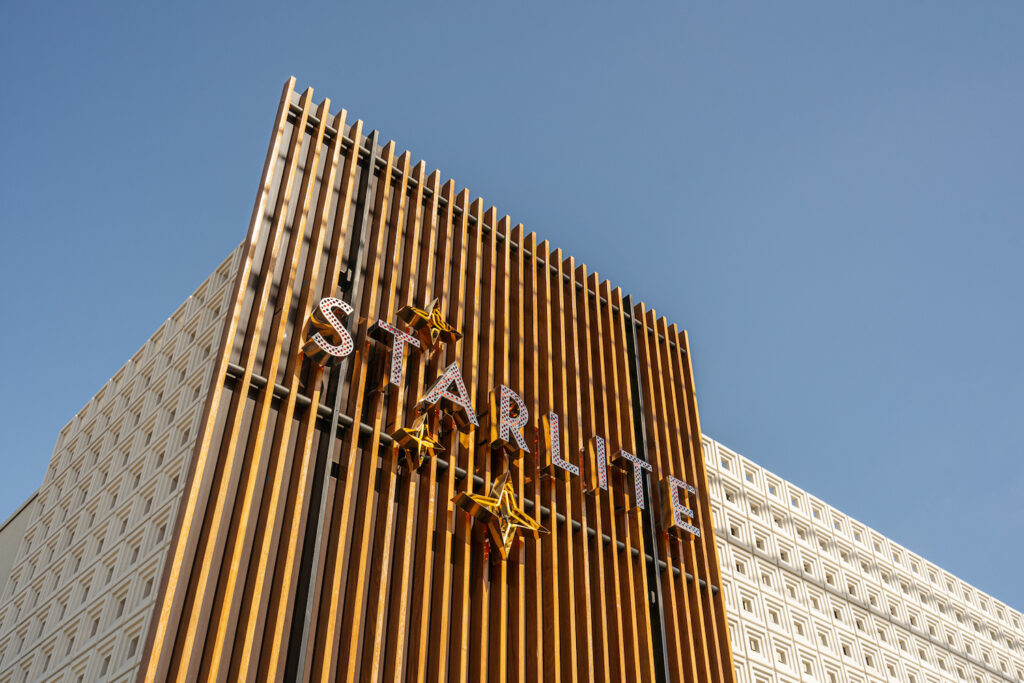 Exterior sign of newly renovated San Diego cocktail bar Starlite owned by Consortium Holdings